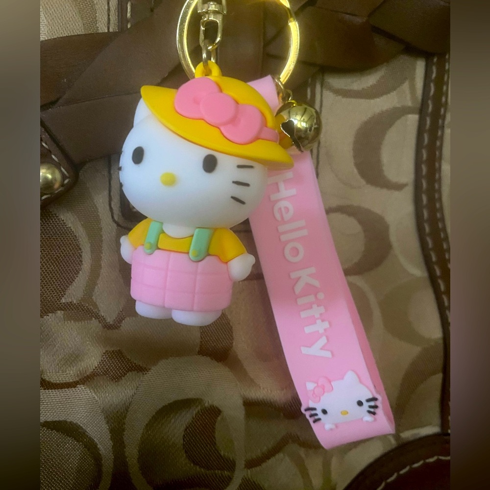 Hello Kitty with a Yellow Bonet Hangtag Keychain Charm Fob